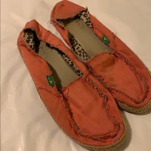 Sanuk slip ons